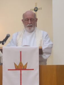 Pastor Bradley Heinecke Preaching the Word from the Pulpit at Shepherd of the Hills Lutheran Church in Horseshoe Bend Arkansas Christian Church. 